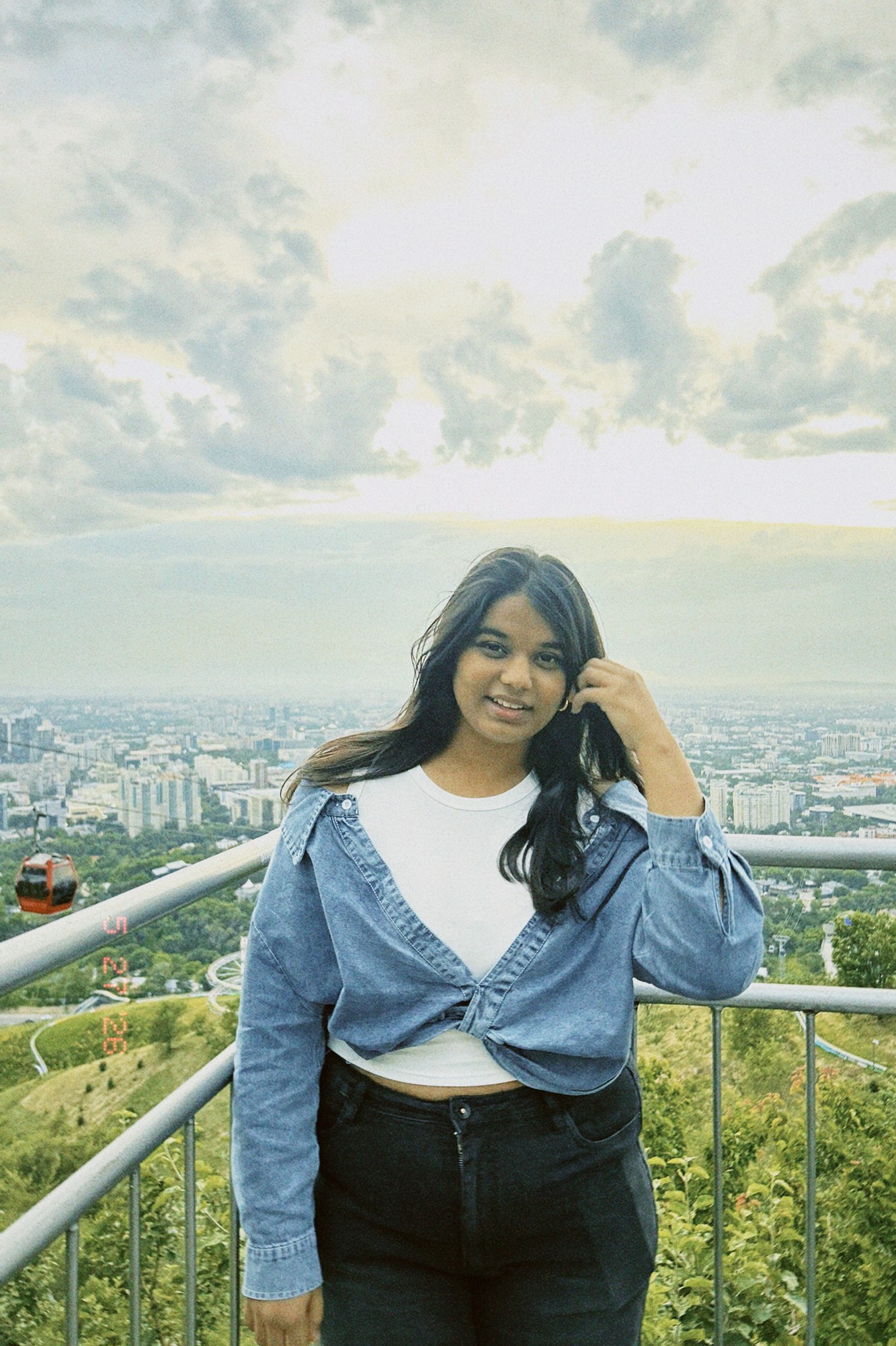 A portrait above the city